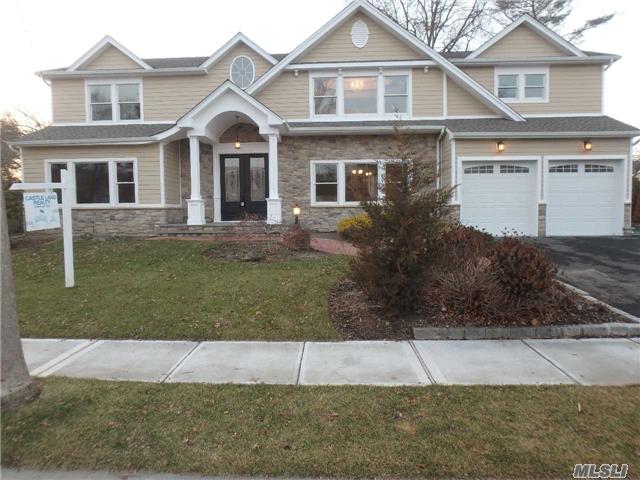 Prepared To Be Wowed. Features Include: 9 Ft Ceilings On First Floor And Basement, Custom Wood Floors And Custom Trim, Wolf And Sub Zero Appliances. Hydronic And Radiant Heating System, Deck Off Master Bdrm, Exterior Is Hardie Board/Stone/Azek Trim, Lg Blue Stone Patio. Too Much To List. This Is A True Must See.