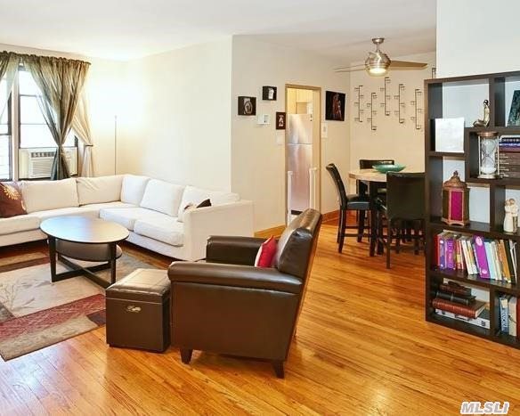 Beautifully Maintained 2 Bedroom 1 Bath Apt On The 4th Fl With A Virtual Doorman. Hardwood Floors Throughout,  With Updated Kitchen And Bathroom. Great Building In A Sought Out Neighborhood Of Briarwood. Close To All Transportation,  All Highways,  Express E/F Train Which Gets You Into Manhattan In 20 Minutes!