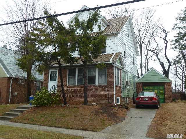 Colonial Home Featuring 4 Bedrooms,  1.5 Bathrooms,  Formal Dining Room,  Eat In Kitchen,  Enclosed Porch,  Full  Basement,  1 Car Garage And Driveway. It Is Situated In Desirable Residential Area And Near Mass Transit,  Lirr,  Major Highways And All. A Must See!