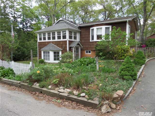 Walk To Beach! Great Entertaining Layout, Flexible Floor Plan, Potential Accessory Apartment W/Proper Permits, Custom & Spacious Eat In Kitchen W/High End Appliances, Vaulted Ceiling, Enclosed Porch, Ceiling Fans, 7 Skylights,  Upgraded Andersen Windows, Bay & Bow Windows, Vermont Casting Wood Stove, Lg Lot W/Plenty Of Off Street Parking,  Fish Pond, 1 Year + Home Warranty