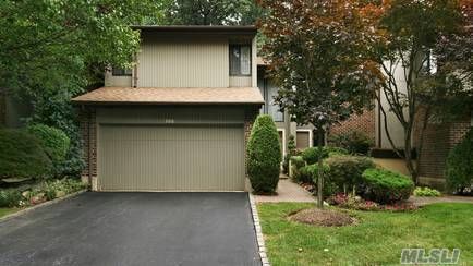 Elegantly Redone Newport Model With Wood Floors, Fireplace, Brick Atrium Garden, Skylights In A Private Cul De Sac Location.