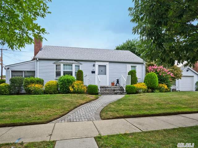 Charming Home Located On Wideline Street,  Great Starter Home,  Freshly Painted With Mature Landscaping. Easy Access To Lirr And Major Roadways.