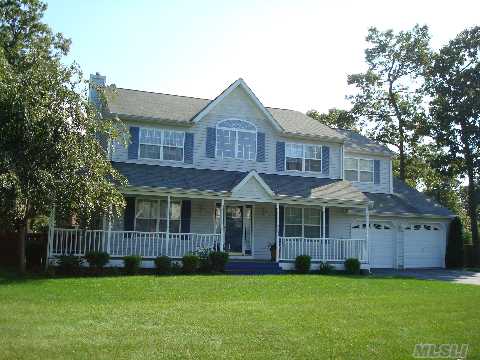 Enjoy The Fall Weather From The Wraparound Rocking Chair Front Porch In This Spacious 4 Bedrm, 2.5 Bath Colonial In A Very Pretty Neighborhood Of Well-Maintained Properties! Brand New Kitchen Floor,Finished Lower Level.Central Air, In-Ground Sprinklers, Fully Fenced Flat 1/2 Acre. Lots Of Big Closets! Move Right In And Enjoy!