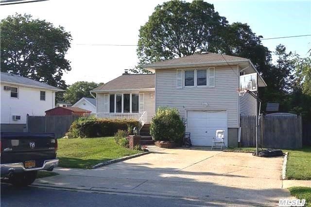 Extended Split 4 Level Home W/Many Good Features. Has An Extended Kitchen W/Brkfst Room, Gas 2 Zn Heat & Sep Hw Htr & Cooking, Hardwood Floors, 1.5 Garage & Finished Basement. Updated Windows, Roof And Siding. 200 Amp Elec. Albany Ave Elementary. Taxes =$8, 608 After Star. Mid Block - A Quiet Dead End St W/Easy Access To Southern St Pkwy, Shopping & Train.