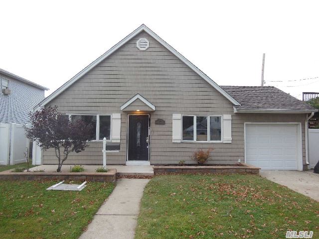 Gorgeous Brand Newly Renovated Home With Cathedral Ceilings And Skylites. This Home Is Completely Redone With Top Of The Line Craftsmanship Cherrywood Kitchen,  Granite Counters,  Stainless Steel Appliances. Beautiful Ceramic Tile Floors Throughout. Master Suite With Full Bath,  Three Additional Bedrooms Huge Second Floor Room. Open Airy Modern Layout With Sliders To Yard.