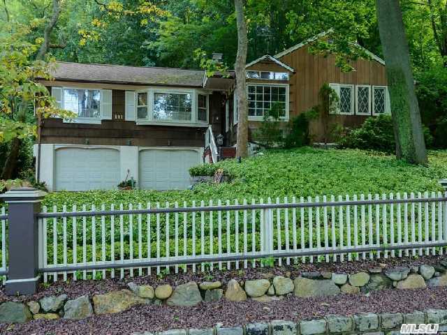 Exceptional Opportunity! This Unique Ranch On A Beautiful Scenic Street In The Heart Of Roslyn Village Features 2 Bedrooms,  3 Baths,  Formal Living Room,  Large Kitchen On Over An Acre Property.  The Home Has A Heated 2-Car Garage,  Driveway,  Front Stairway And Portico.