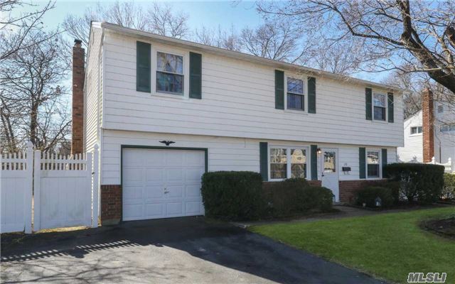 Home Awaits In This Charming Islip Split! Features Include An Updated Kitchen W/ Stainless Steel Appliances, Wood Floors, Formal Dining Room, Den W/ Fireplace, Extended Master Bedroom, Gas Heat, New Deck & More! Convenient To Area Restaurants And Shopping!