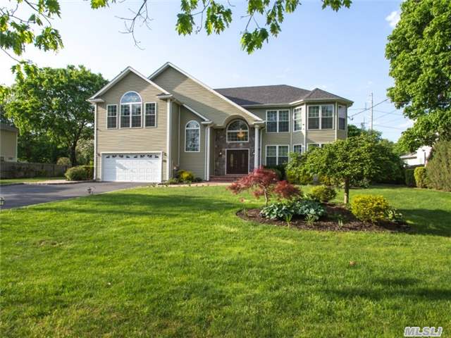 Built In 2007. South Facing, Sun Filled And Spacious N.Syosset Home Now Awaits You. 2-Story Grand Entry Foyer, Approx 3, 800Sq', A Potential Of 6Br, 3.5 Bths, Gourmet Eik/Cherrywd Cbnt, Wine Fridge, Cent Vac, Famrm W/Wood Burning Fpl, Surround Sound Sys, Sec Camera/Alarm, 2Car. 2000Sq' Entertainment Delight 8Ft Bsmt Ceil, Theatre, Recrm, Fully Landscpd