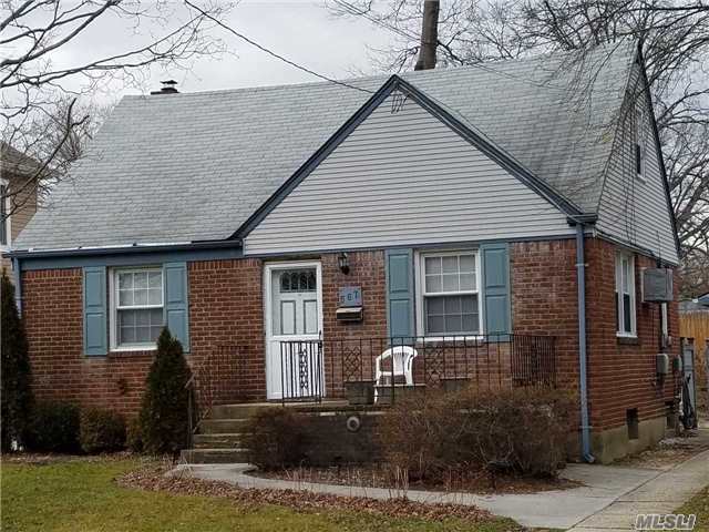 Well Maintained Cape On Cul De Sac, Dead End. Wood Floors, Large Yard, Move In Condition, Great Starter Home.  Detached 2 Car Garage,  Full Basement.
