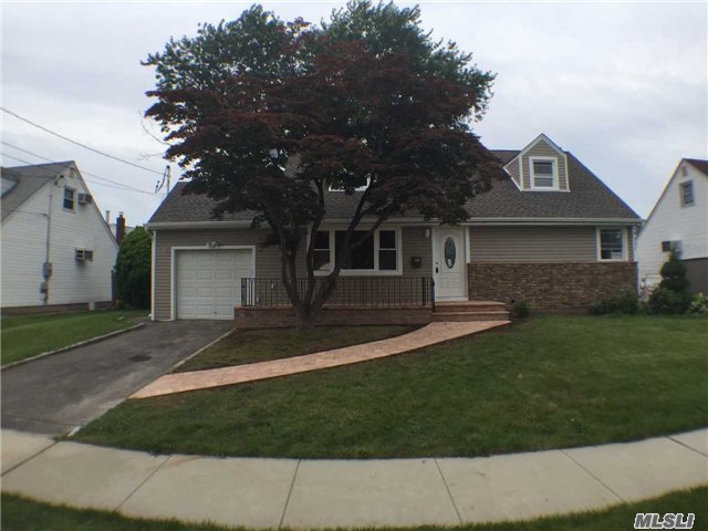 Like New! Completely Remodeled 4 Bdrm, 2 Bath Cape W/Basement & Ose. New Roof, Window , Siding. Garage Attached, New Htg, New Baths, New Kitchen, Good Landscape. All Around Best Buy! Do Not Miss!