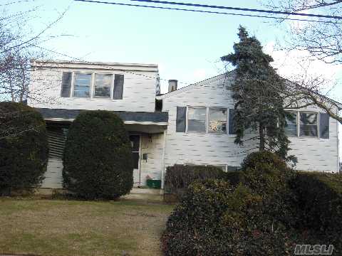 Large 5 Bedroom Executive Split,  2 Full Baths, Lower Level Den. Lr/Fdr/Eik, Attached Garage.