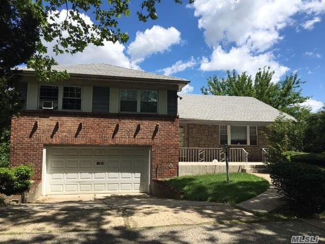 Beautiful Brick 3 Bedrooms 2 Bathrooms Split Level House, On A Large Lot In The Briarwood Section Of Queens. Updated Kitchen And Baths. New Roof And Heating System, Gas Cooking, Cac, Sprinkler And Alarm System, Close To All!