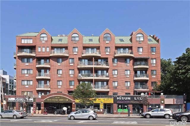 The Subject Condo Is Located In The Heart Of Downtown Flushing. Two Bedroom/Two Bath With Open Kitchen With Breakfast Bar, Granite Countertops, Cherry Wood Cabinets, Hardwood Floors, Marble Tiled Bathrooms. 24 Hr Doorman And Indoor Parking. Five Minutes Walk To Subway And Lirr.