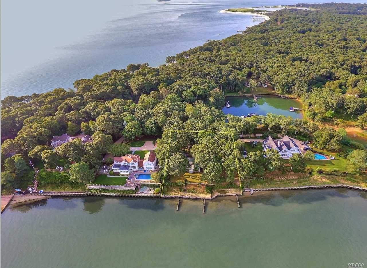Diamond in the rough! A Rare Paradise Point Bayfront Opportunity in a Stunning Location that offers Spectacular views of Southold Bay, Shelter Island and Breathtaking Sunsets. 175&rsquo; on the water, Wooded, Private and an Association Marina Basin just steps away!  Fulfill your Dream in this Spectacular Estate Setting by Updating a Four Bedroom Ranch with large, sprawling footprint. Great Potential, Must See!