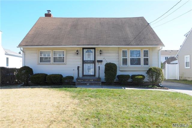 Rear Dormered Cape In Wantagh School District. Granite Eat In Kitchen, Central Air, Gas Cooking, Full Basement, Detached Garage, Mid Block Location. Won&rsquo;t Last!