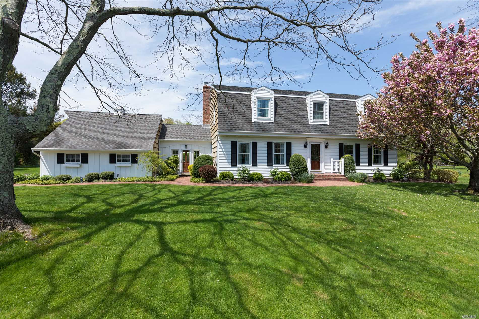 This is the best of the North Fork! Come home to this lovely Dutch Colonial located on a quiet cul-de-sac. Wonderful private garden w/ privets around your 20x40 ig heated swimming pool. This home welcomes you and your guests w/ 4 brs, 3 full baths, formal DR, LR, EIK, family room w/ fp, sunroom, and finished basement! Wood floors throughout, new windows, heater, furnace, new cac, and more! Founders landing district w/ potential for boat dock depending on lottery system, not guaranteed.