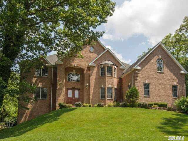 A Serene Tree-Lined Drive Enhances The Privacy Of This Majestic Custom Blt Brk Col. Sited On 2+ Magnificent Acres In The Heart Of Roslyn.Enjoy Unobstructed Views From This Elegant Home.The Epitome Of Quality Enhances This 5900 Sqft Residence Filled W. The Finest Materials&State-Of-The-Art Amenities, Open Flr Plan Showcasing Soaring Ceilings, Expansive Chef's Kit, + Great Rm.