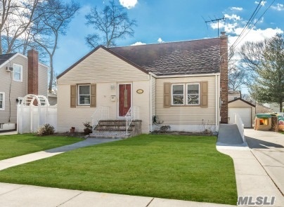 Warm Bright & Welcoming Beautifully Kept Updated Home. E-I-K, Spacious Formal Dining Rm, Lr, 4 Brs, 2 F/Bths, F/Finished Bsmt, Hard Woods Fls, Paved Patio, Plenty Of Storage, 1.5 Det Garage, Gas Heat. Great Mid-Block Location Quiet Neighborhood In The Heart Of Wantagh Wood.