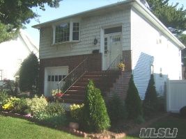 Updated 6 Bedroom High Ranch In The Park Section Of Mineola. Near To Lirr And Hospital. Recent Updates- Kitchen, Windows, Boiler, Refinished And Painted Hardwood Floors. Great For Large Family. Full Unfinished Basement And A 1 Car Garage. Don't Miss This Opportunity!