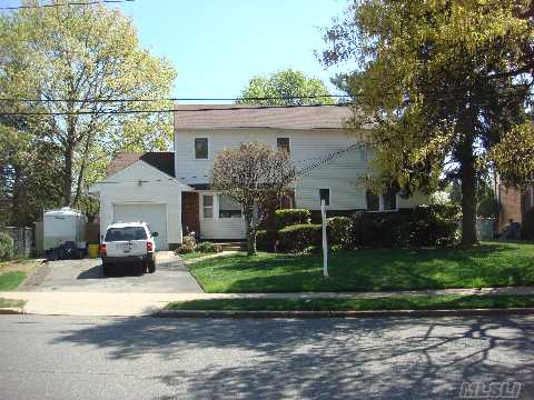 Large Colonial With Oversized Property.  All Large Rooms, Beautiful New Country Eik, New Baths, Master Suite With Tub And Stalled Shower.  Deck Off Master Suite And Dining Room.  Many Large Closets And Storage.  Gas Cooking And Heating.  Jericho Schools.  Jackson Elementary.