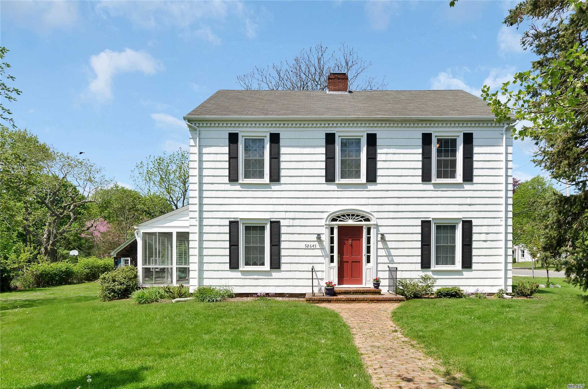 This Classic Center Hall Colonial Offers The Opportunity For Gracious Living With A Center Hall Winding Staircase, Lr W/Fpl, Fdr, Eik, Office/Br, 4 Bedrooms, Full Walk-Up Attic, Screened Porch.  Street Gas, Public Water. In Town Location - Walk To All. Zoned Residential Office. All On Approximately 1/2 Acre.