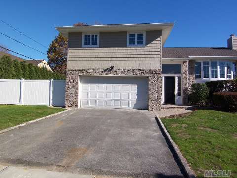 A One Of A Kind, Newly Constructed From The Ground Up, 4 Bedroom, 2.5 Bath Split. New Windows,Cac, Pavers, Fence, Boiler,Doors, Hardwood And Ceramic Tile,Ss Appliances, Carrara Marble In Eik, Calcutta Marble In Bath, Vaulted Ceilings,Crown Moldings, Coffered Ceilings,Extreme Attention To Details ,30 Year Architectural Roof,Master Craftmanship