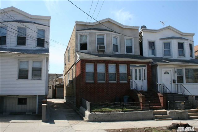 Detached Two Family Home. Three Bedroom Apartment Over Two Bedroom Apartment, Finished Basement, And A Two Car Garage.