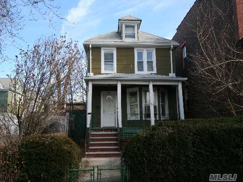 Detached One Family Home Features Two Bedrooms, Two Full Baths, Living Room, Dining Room, Kitchen, Walk-Up Attic, & A Full Basement. House Needs Tlc.