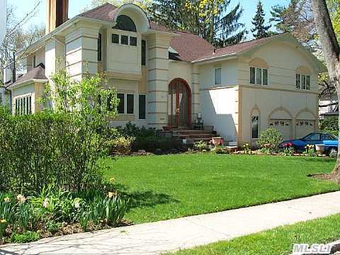 Gorgeous - Bright & Spacious Colonial. Beautiful Built In Wood Work Throughout The House. A Must See !!