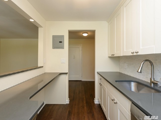 This Fantastic Apartment Has Been Completely Renovated With Quality Materials And Craftsmanship! The Kitchen Features Quartz Counter Tops With Marble Back Splash,  Cushion Close Cabinetry,  A Wine Refrigerator And Wood Floors. The Bathroom Has A Pedestal Sink,  Marble Tile Walls And Floor. This Is A Sponsor Owned Unit And A Board Application Is Not Required. Near L.I.R.R.