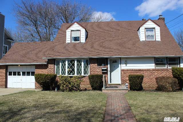 Mid-Block, Sunny,  Bright Expanded Cape. 4 Bedrooms, 2 Full Baths, Full Basement.Lots Of Storage!Walk-In Closet, Rear-Dormered, Hardwood Floors Thru-Out.Close To Transportation, Shopping, And  School. Pvc Fenced Private Yard ****Facing South****