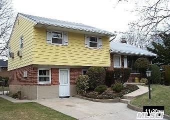 Jackson Elementary School. Expanded White Birch Split Level. Perfect Mid Block Location. Private Rear Yard. Expanded Eik, New Baths, Expanded Den, Finished Basement, New Roof, Gas Cooking.