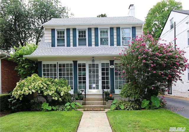 Charming 3 Bedroom 2 Bath Colonial. Enclosed Porch, Spacious Living Rm With Hardwood Floors & Fireplace. The Formal Dining Rm Is Adjacent To The Eat-In-Kitchen With Skylight. Full Bathroom On First Floor & Beautiful Country Backyard With Deck. Second Floor Has 3 Generous Sized Bedrooms & Full Bath. Finished Basement. Long Driveway & Garage. Near Northern Blvd & L I R R