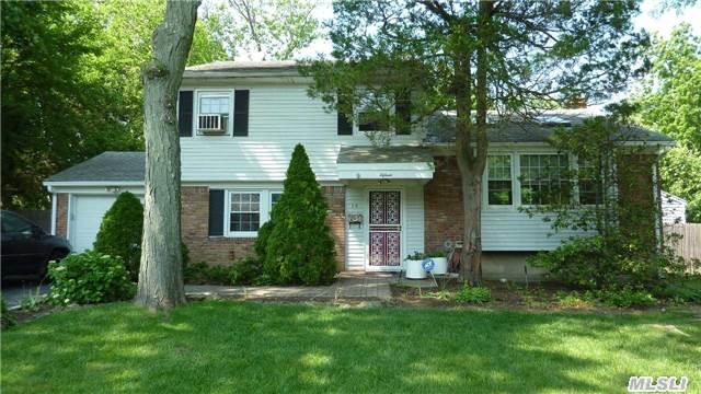 This Spacious Mid Block 4 Br Split Level Home Has An Open Floor Plan Sure To Delight. It Has A Vaulted Ceiling In The Main Living Area With 2 Skylights That Drench The Space With Light. It Boasts A New Granite Kitchen With Ss Appliances, Updated Bath, And A Large Flat Backyard, With A Very Large Shed For Storage. 1st Floor Bedroom For Mom With A Full Bath Close By.