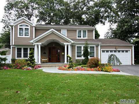 Newly Renovated In 2006, Lovely Porch In Front Of Home. State Of The Art Eik, Large Sunroom, Master Suite With Catedrial Ceilings, Marble Master Bath, 4 Bedrooms, 3.5 Baths, One Of The Best Streets In Jericho! Dont Miss This Home, Turn Key! 