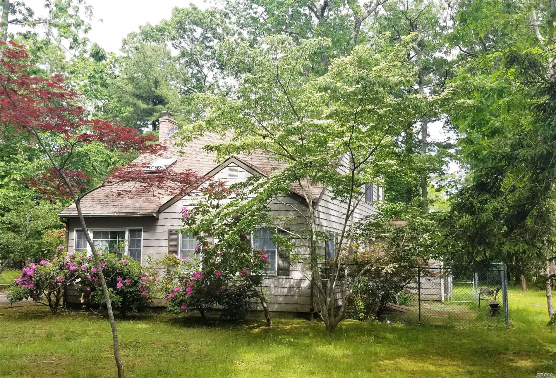 Come view this cute-as-a-button North Fork getaway, quietly tucked away in the woods near the east end of Great Hog Neck. There&rsquo;s a beautiful private beach for the Paradise Shores community at the end of the lane. Second floor master suite with library, formal dining room, CAC. Don&rsquo;t miss out!
