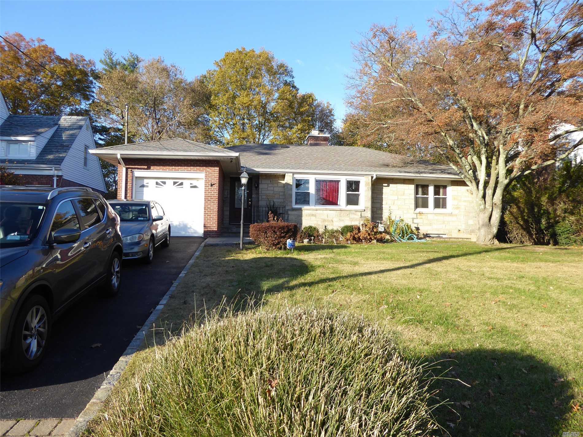 Step Inside This Lovely Brick And Stone Ranch Home. 3 Br's 2.5 Baths, With A Full Basement, Partially Finished. The House Has Many Updates Including The Roof, Boiler, Windows, Bathroom, Dishwasher. Kohler 14Kw Whole House Generator Keeps The Lights On. Gas Stove. The House Is On A Quiet Street, Mid Block Location With A Huge Backyard For Entertaining, Room For A Pool. Close To Beaches, Parks And Center Of Town.