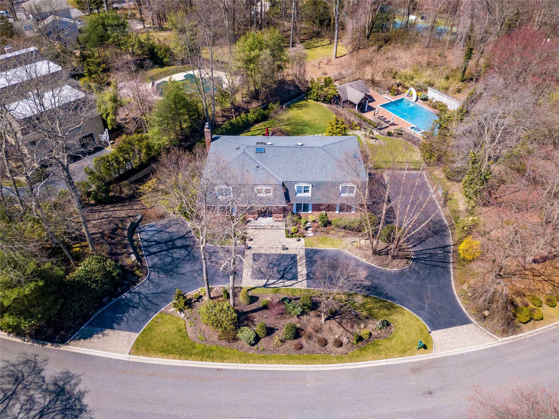 Magnificent Center Hall Colonial In Exclusive Gates Of Woodbury. Diamond Condition, Fully Renovated 7 Bedrooms, 3.55 Baths On 1.1 Park-Like Acres With Heated In-Ground, Salt Water Pool, Cabana, Built-In Bbq, 3 Car Garage, Oversized Rooms, Gas Generator, Tesla Charger, Fido Fence, Syosset Schools. Too Many Extras To List.