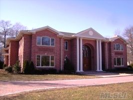 This Very Impressive 8100 Sq. Ft. Residence Was Custom Built In The Year 2009. Over 9.5 Foot Coffered Ceilings With 8 Foot Doors Custom Millwork And Very High End Quality Details. The Quality Of The Craftsmanship And Materials Is Unrivaled. The Huge Kitchen Is Equipped With Every Amenity.