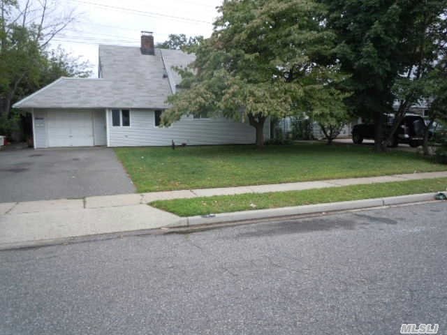 Lovely Ranch In Island Trees School District #26. Four Bedrooms, 2 Full Baths. Master Bedroom On Main Level 27'X12'. Versatile Floor Plan. Could Be Possible 12'X27' Living Room, 12'X16' Dining Room & 3 Bedrooms. Oversized Garage With Heat. Large Property 60X140. Perfect M/D With Permits. Don't Miss This One, Low Taxes!