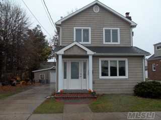 Welcome To This Totally New Renovated Home. It Has Everything Brand New. All New Sheet Rock, High Hats, Custom Entrance. Completely Rebuilt In 2007. The House Is On A 50 X 100 Lot With 1.5 Detached Garage. Near Shopping, Railroad, Highways, And Schools.