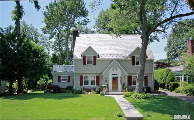 Classic Munsey Park Center Hall Colonial On Oversized Lot With Sprawling Rear Yard.  Fully Updated 5 Bedroom,  4.5 Bath Home With High-End Finishes Including Hardwood Floors,  Crown Molding,  Granite Kitchen,  Finished Basement,  Oversized Master Bedroom,  Back Up Generator And Alarm.  Full Size Stairway To 3rd Floor Leads To Two Additional Bedrooms And 1 Full Bath.