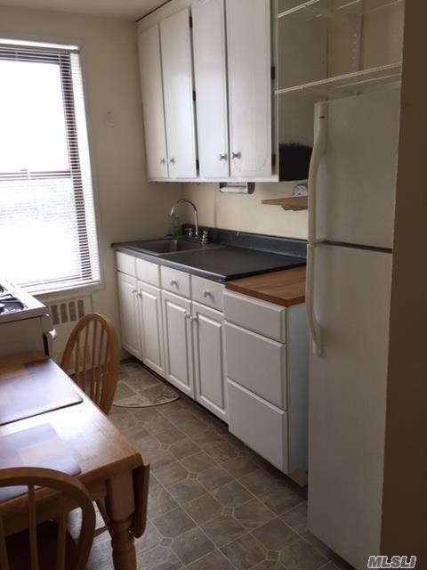 Bright, Sunny Studio Apartment With In Excellent Condition With Murphy Bed And New Appliances, Eat In Kitchen. Well Maintained Building With Two New Laundry Rooms. Waitlist For Garage Space. Located On A Quiet Street Two Blocks From Lirr, Shopping, Restaurants.