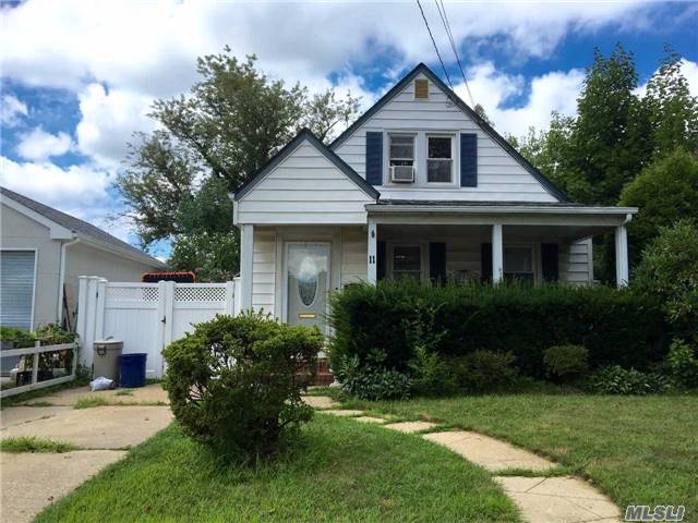 Great Price, 4 Br, 2 Bath, Full Basement, Hardwood Floors Throughout. Desirable Herricks District, Upgraded Electricity, Updated Kitchen, Beautiful Garden. Near Public Transportation. Convenient To Schools. Full Basement With Outside Entrance. Front Entrance With Closet. Must See!!