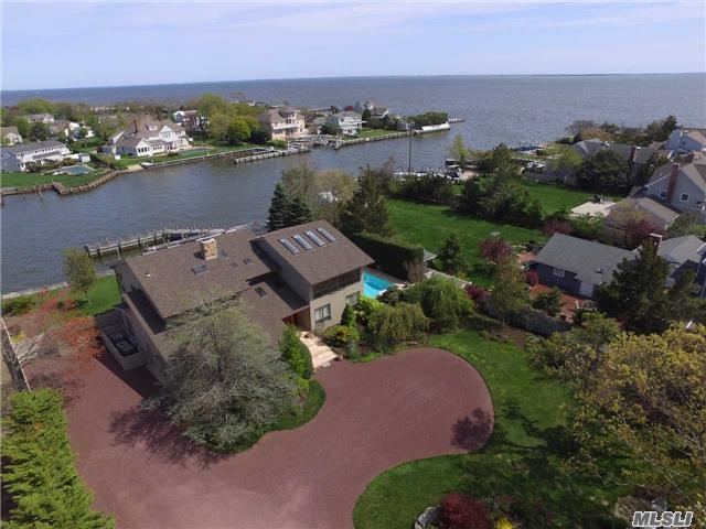 Bayberry Point Waterfront On Enormous Middle Canal With Bay Views & Highly Protected Docking. (Bring The B I G Boat) Hidden Behind The Hedge & Behind The Gate Is The Builders Own Home, So You Know What That Means. If You&rsquo;ve Been Waiting For One Of The Most Desirable Locations In Bayberry Point, You Just Found It!