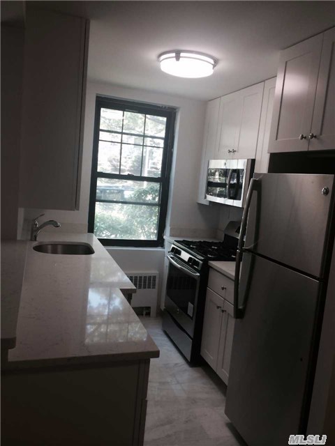Beautifully Renovated Condo On Tree-Lined Street, Featuring Marble & Quartz In Kitchen With Stainless Steel Appliances, Marble Floor In Bathroom, Wood Floors Have Been Redone Throughout Unit. Free Parking Available On Site.