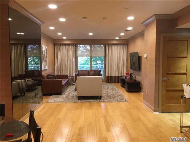 Turn Key 2 Bedroom, 2.5 Bath. This Is The Only Unit Custom Built With 9Ft Ceilings! All Custom Wood Doors, High End Baths. Upgrades Throughout Unit...Must See! Resort Amenities, 24/Hr Concierge, In/Outdoor Pool. Two Parking Spaces.