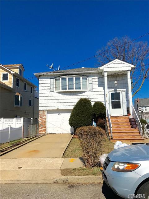 Rare, Rare Opportunity To Purchase A Hi-Ranch On A Cul-De-Sac In Queens Village! The First Level Features A Living Room, Dining Room, Kitchen, 2 Bedrooms & A Full Bath. The Second Level Has An Modern Eat-In-Kitchen, Spacious Lr, Fdr, 3 Bedrooms (Master Bedroom Has A Bathroom) & Another Full Bath. Private Driveway With An Attached Garage. Conveniently Located!