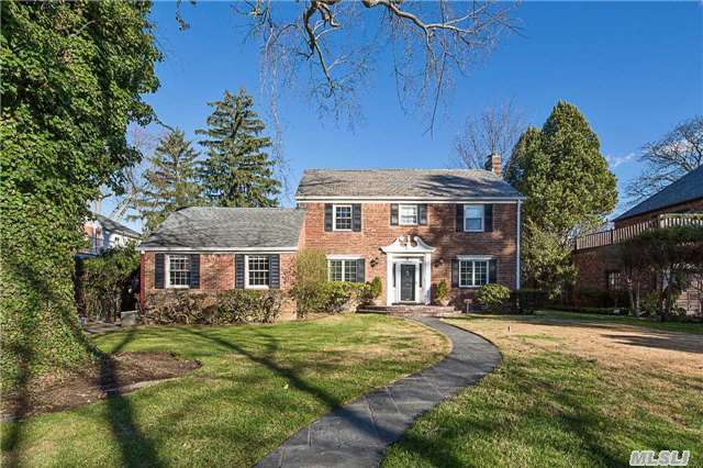 Brick Center Hall Colonial On Quiet Tree Lines Street. Newly Renovated With Designer Baths And Chef's Kitchen. Fully Renovated Basement Playroom And Large Yard. Magnificent, Grand Family Room With 10 Ft Ceilings Can Double As A First Floor Guest Suite. Close To Transportation And Walk To Worship