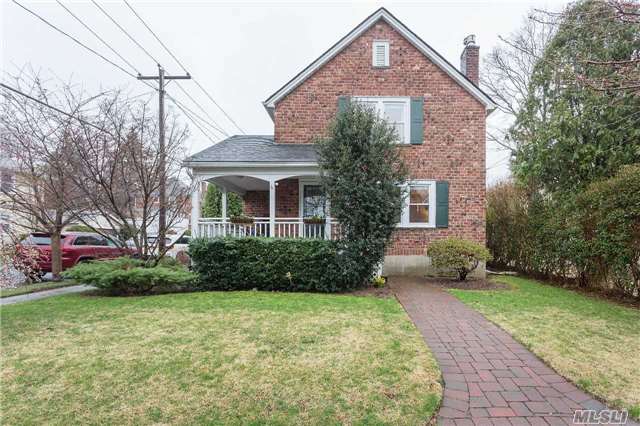 3 Bedroom, 1-1/2 Bath Brick Colonial. Corner Lot With Large Front Porch. Hardwood Floors Throughout The Entire Home. Living Room Has Gas Fireplace, Large Formal Dining Room That Leads Into Updated Kitchen With Newer Stainless Steel Appliances And A Powder Room. Full Finished Basement With Laundry. Home Includes Many Updates; Central Air, In Ground Sprinklers And Solar.